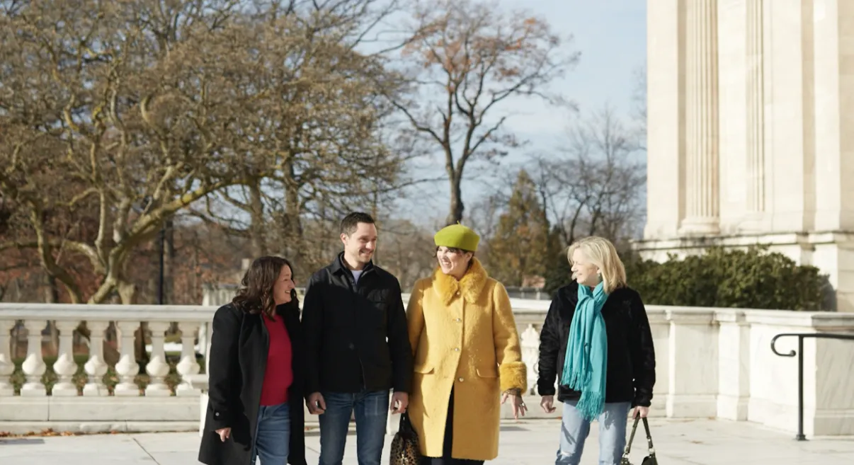 A photo of Studio Chartreuse partners walking and talking in front of the Cleveland Museum of Art